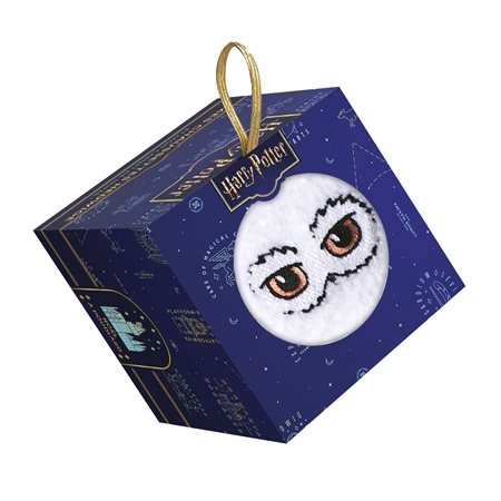 Harry Potter : Coffret mes chaussettes Hedwige : Un carnet de notes et une paire de chaussettes à l'effigie d'Hedwige, la chouette d'Harry Potter.